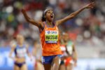 sifan-hassan-of-netherlands-celebrates-wining-gold-in-the-news-photo-1575581926