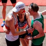 runners-of-the-mass-race-get-emotional-at-the-finish-line-news-photo-1582202535