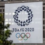 tokyo-2020-olympics-banner-is-displayed-on-a-building-on-news-photo-1584975427 (1)