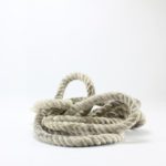 close-up-of-tangled-rope-against-white-background-royalty-free-image-1588172183