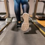 close-up-of-woman-training-in-gym-on-a-treadmill-royalty-free-image-1592333758