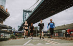 Group,Of,Urban,Runners,Running,On,The,Street,In,New