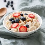 porridge-with-berries-in-a-bowl-royalty-free-image-1011949898-1559339734