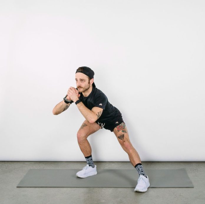 Standing Stretches for Runners | Runner's World Australia and New Zealand